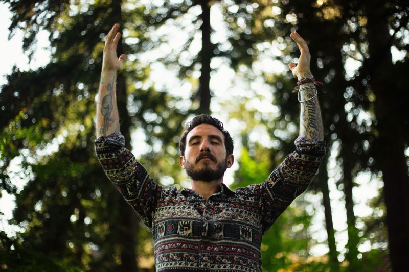 Sean with arms up